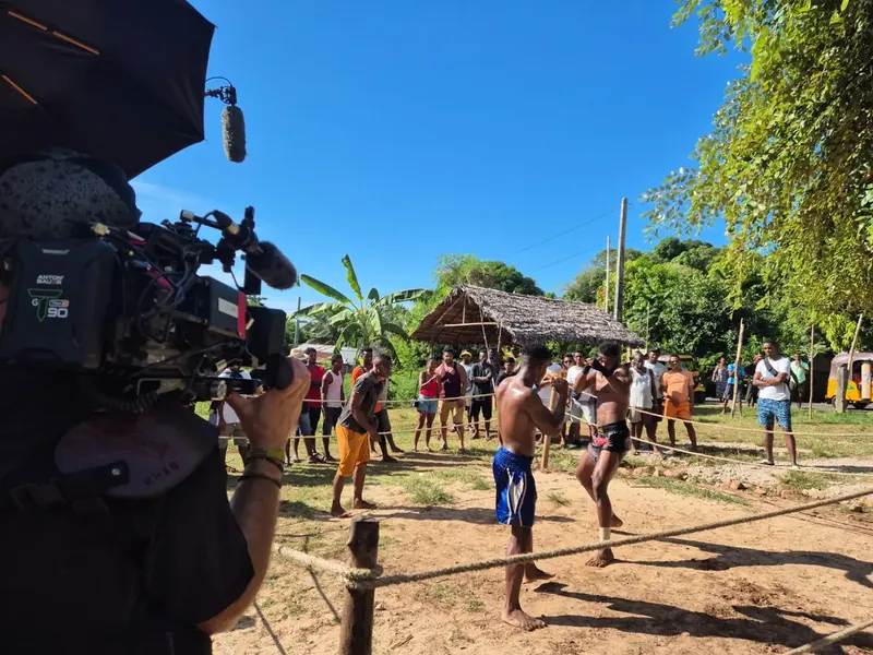 Film crew shooting a moraingy, traditional Malagasy fighting, in a village